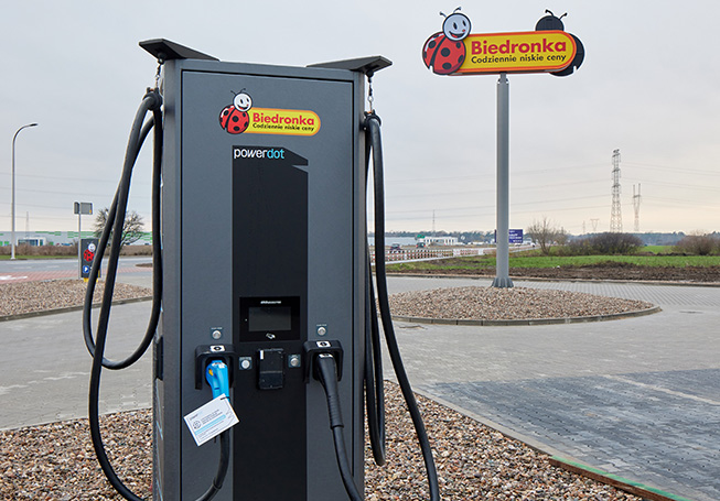 Charging station for electrical cars in a parking lot (photo)