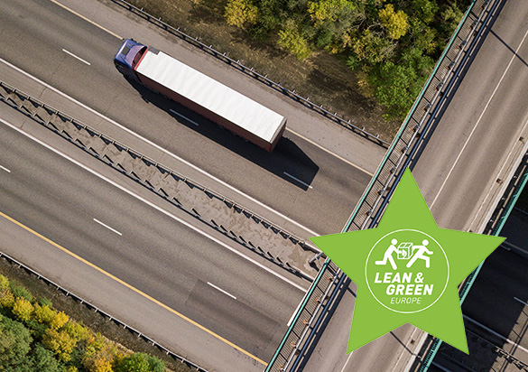 Road intersection from above with one big truck on the road (photo)