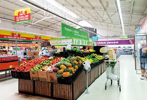 Full fruit shelves in a store (photo)
